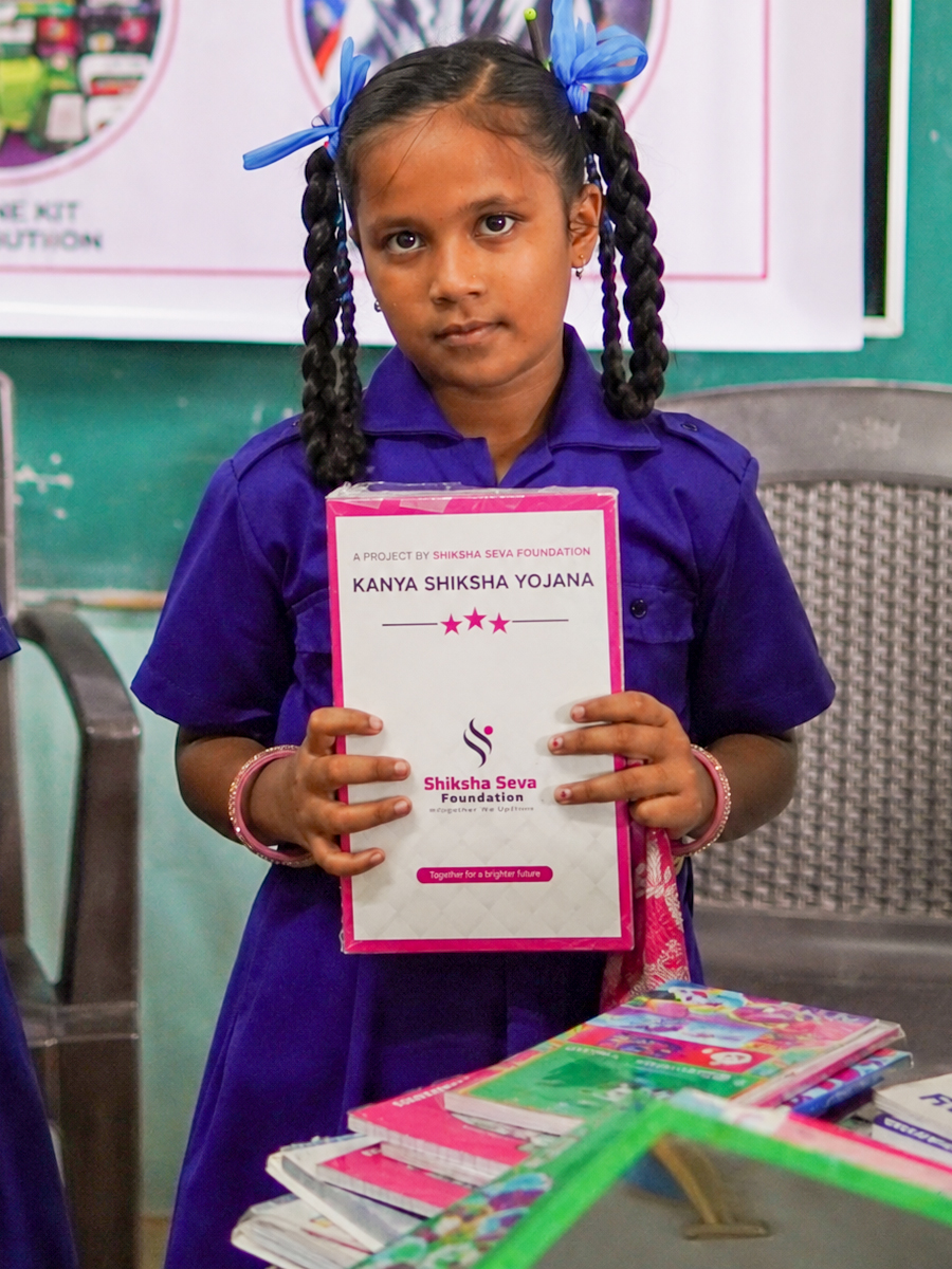 Child holding books